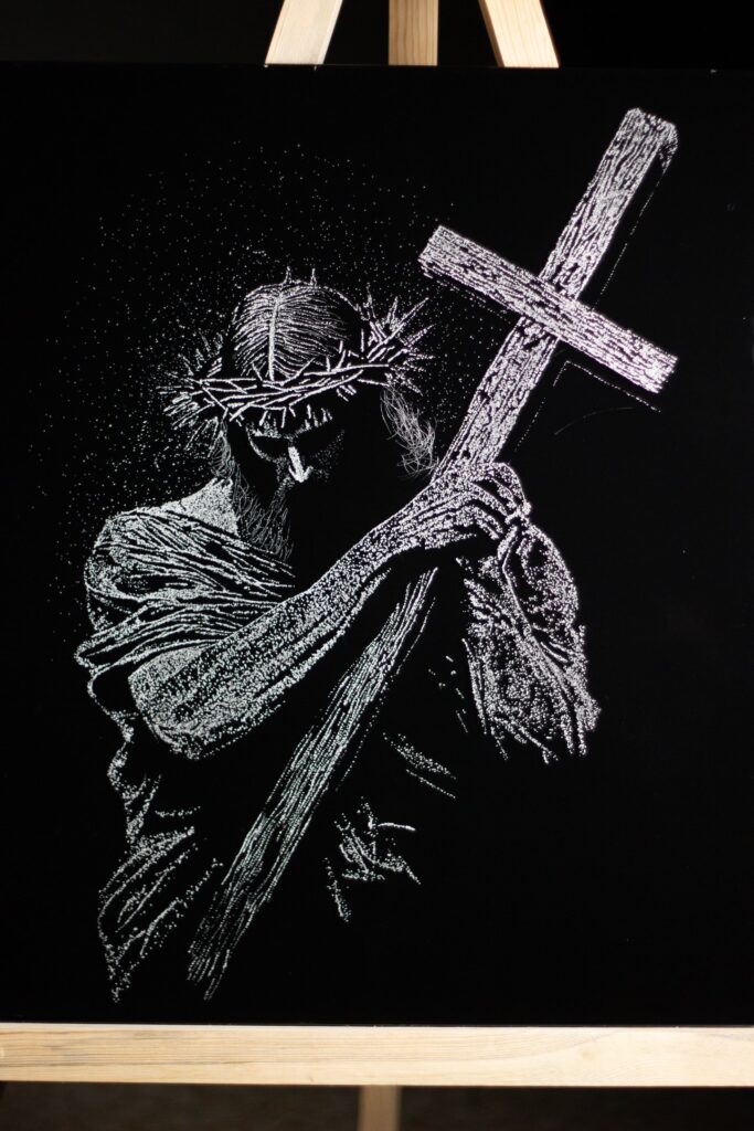 Jesus Christ in shattered glass art by Yasin Uca