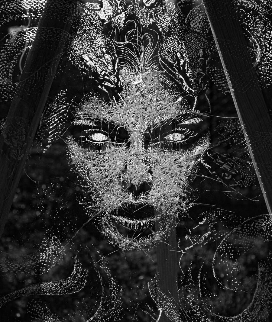Medusa Gaze — Medusa’s face framed by snakes in fractured glass